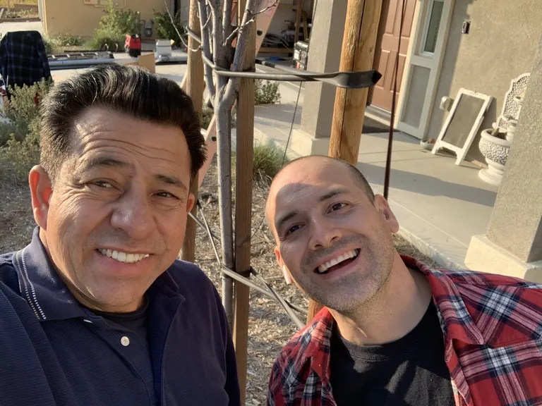 Two SolarCCS installers on a job site serving Woodcrest, CA
